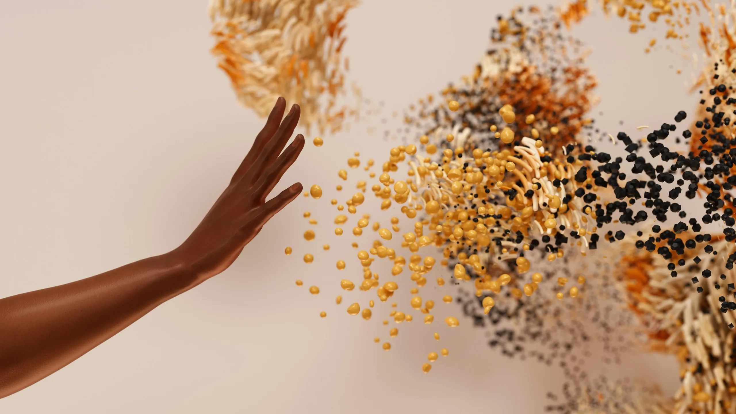 A hand reaching toward a burst of orange spheres and pasta-like strands