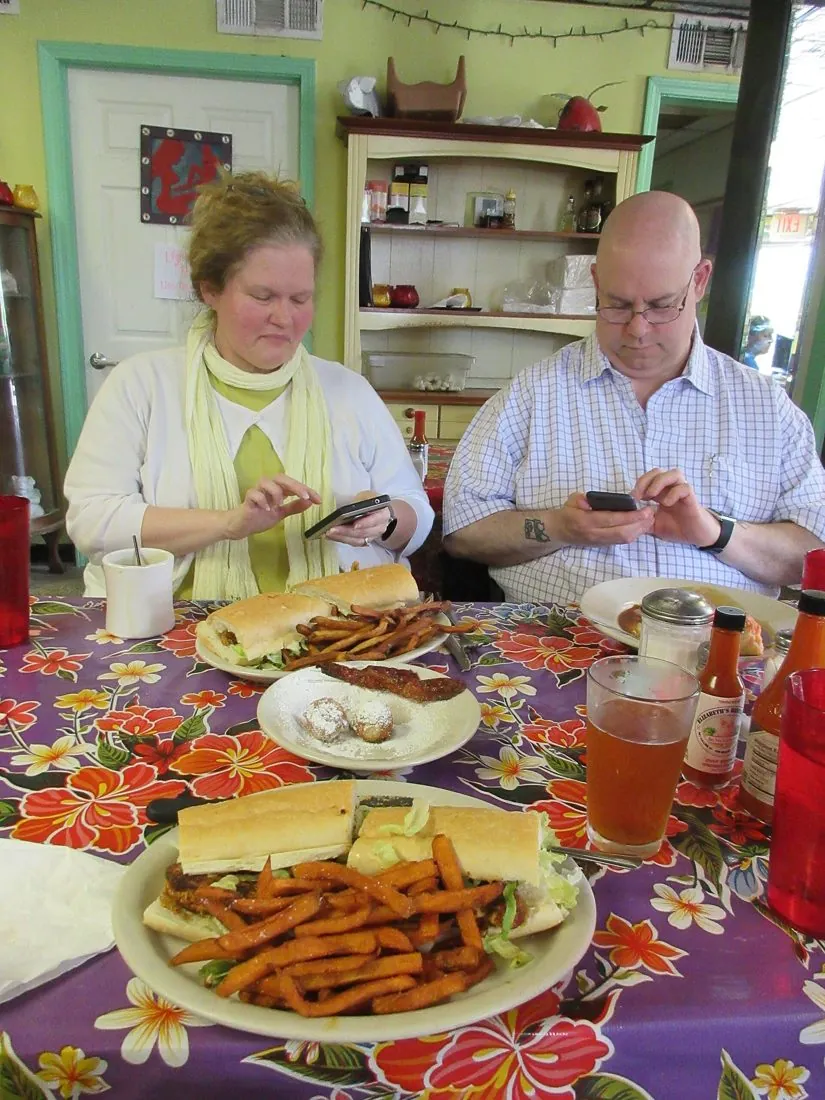 Two people eating together at a restaurant